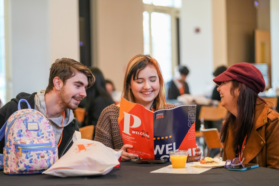 Students talking and laughing at University of the Pacific's Week of Welcome orientation.