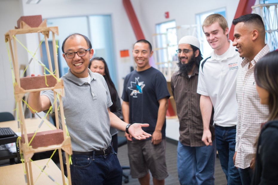 University of the Pacific civil engineering students look at a model